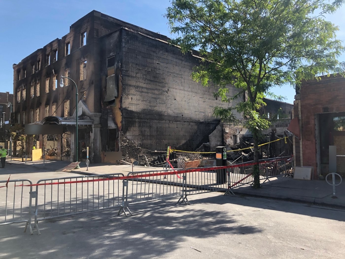 Fire-damaged brick commercial building